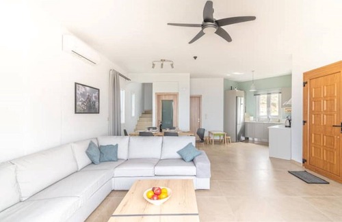 Lygaria Villa | Swimming pool with view to the sea.