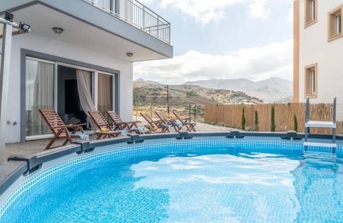 Lygaria Villa | Swimming pool with view to the sea.
