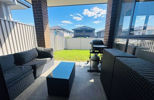 Austral House | Sydney's Leading 5 Bedroom home with AC, TVs and Study - Home away from home