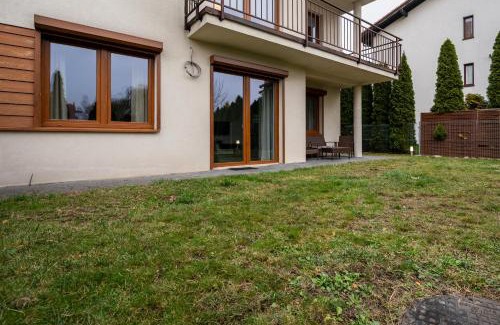 Lodz Apartment | Tabelowa Deluxe Apartament with Garden