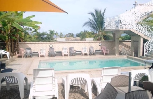 Kribi Apartment | Tahiti-Apartment-Family-Ensuite with Shower-Garden view