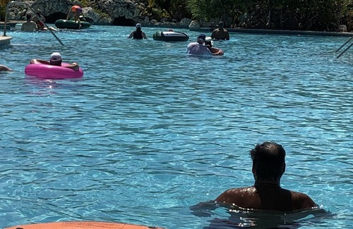 Greening Glade Resort | Taino Beach Bahamas 1 or 2 bedroom suite poolside with covered patio and beach