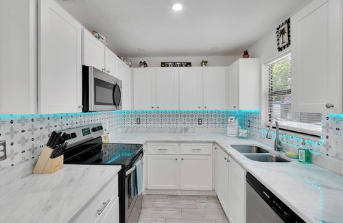 Sun Bay South House | Tampa Escape: 4BR, 9-Bed Home, Game Room & Firepit