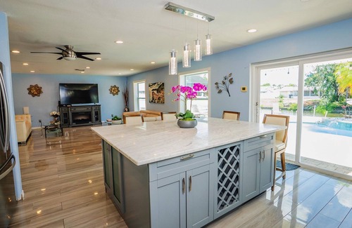 Tampa Shores Villa | Tampa Retreat: BBQ, Pool/Spa, Canal