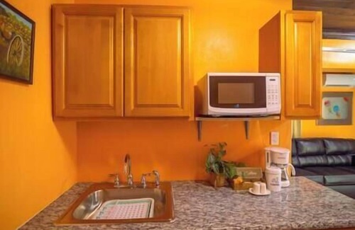 Coral Harbour Apartment | Tangerine Sunsets Mango