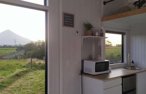 Midhirst House | Taranaki Creekside TUI by Tiny Away