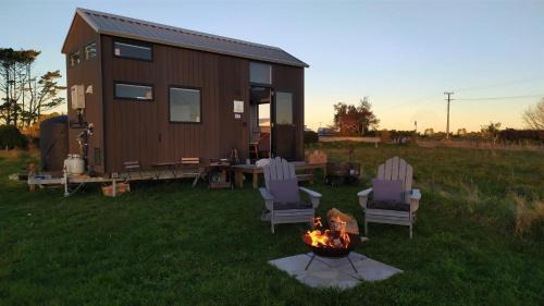 Midhirst House | Taranaki Creekside TUI by Tiny Away