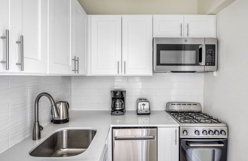 Gold Coast Apartment | Tasteful Gold Coast 1BR w/Doorman & Gym, 2 blocks to L, by Blueground