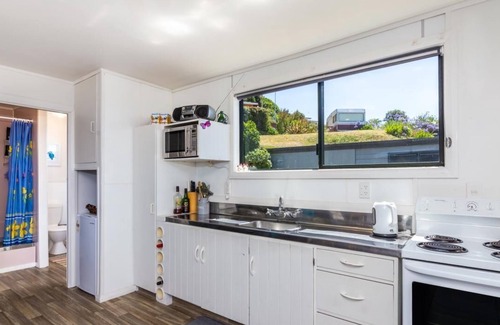 Whareroa Village House | "Te Hokinga" - Whareroa Classic Kiwi Bach Escape