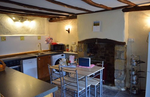 Marhamchurch Cottage | tea cosy cottage mid terrace cob house pub 500 meters beach 3 miles.
