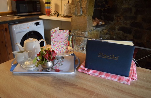 Marhamchurch Cottage | tea cosy cottage mid terrace cob house pub 500 meters beach 3 miles.