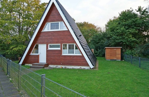 Damp House | Tent roof house with fence and beautiful grounds - - with electric awning