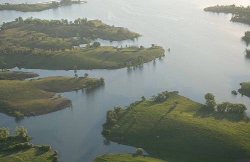 Loup City RV Rental | Tentrr State Park Site - Nebraska Sherman SRA – Redwood Lakeview A – Single Ca