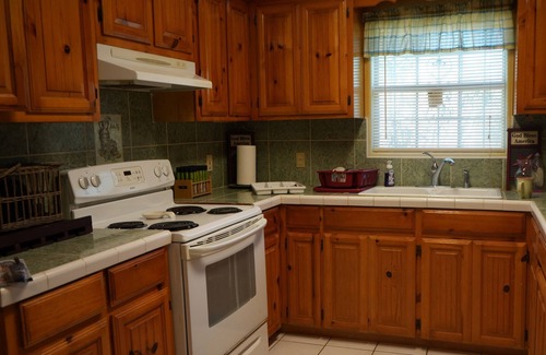 Cameron County Cottage | Texas themed cabin with a Shared fishing pier Not waterfront