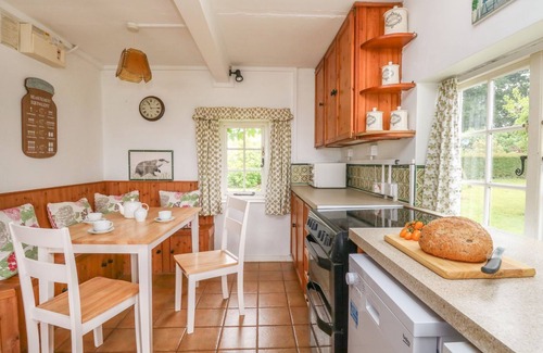 Buckland Newton Cottage | THATCH COTTAGE, pet friendly, with open fire in Buckland Newton