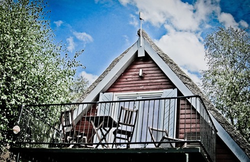 Goldberg House | Thatched boathouse in Goldberg on the Mildenitz with fishing boat