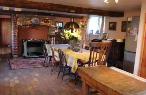 Cheveley House | Thatched Cottage - with dog Poppy
