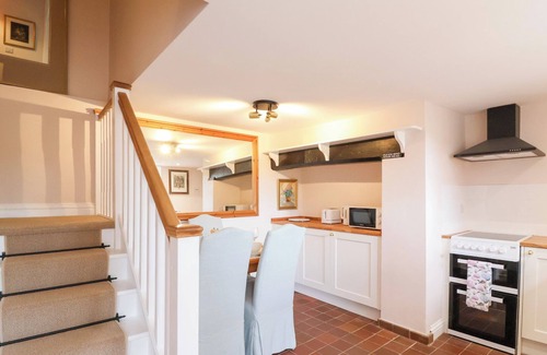 Sherborne Cottage | THATCHERS END, character holiday cottage, with a garden in Sherborne