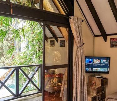 Nairobi Ski Chalet | The Annex at 64 : Cozy, rustic cottage/treehouse