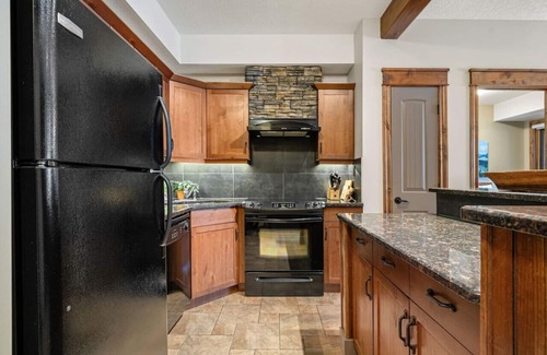 East Kootenay Apartment | The Antler Hideaway | Pool | Hot Tub | Fireplace