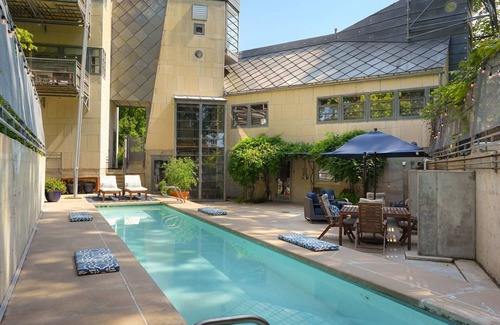 Lawrence House | The Architect’s Modern Castle with Heated Pool and Expansive Private Patio