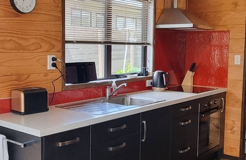 Wharewaka House | The Bach in old Wharewaka well located for a fabulous lake holiday.