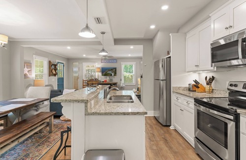 East Beach House | The Beach is calling you at The Porch Side Cottage, sleeps 9