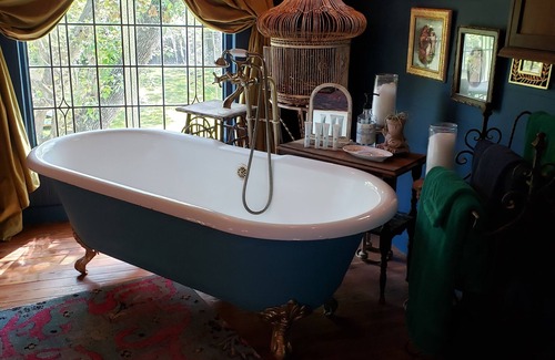 Dickinson Bed & Breakfast | The Birdcage Saloon is true hidden gem, in a secret garden. Romance awaits here