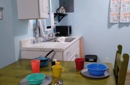 Claude Cottage | The Birdhouse in Texas - Try Us in a Small Town!