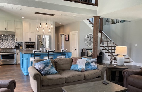 Tyler House | The Blue House on Two Lakes