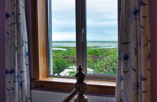 Carrigaholt House | The boathouse: modern house by the sea
