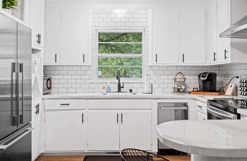 Greensboro House | The Boro Bungalow. A Mid-modern home. King beds.