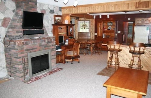 Ludington Cottage | The Bunkalow Lakefront Compound w Lifts for your Speed Boat & Tritoon