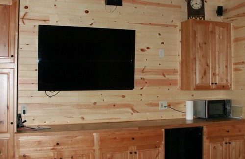 Ludington Cottage | The Bunkalow Lakefront Compound w Lifts for your Speed Boat & Tritoon