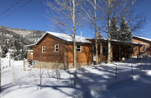 Holman Cabin | The Cabin back deck offers stunning views and only 15 minutes from Sipapu Skiing