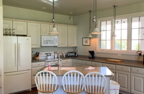 Hobucken House | The Cala Lily: A Luxury Water Access River Beach Home with Wraparound Porch