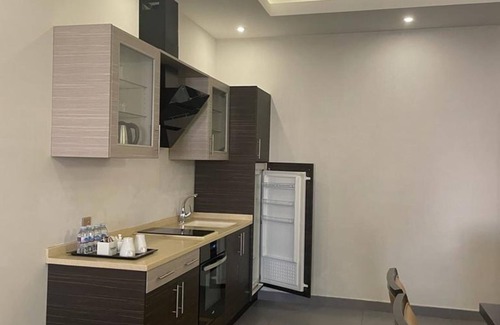 Al-Rawdah Hotel | The Capital O 672 Refal Homes Suites