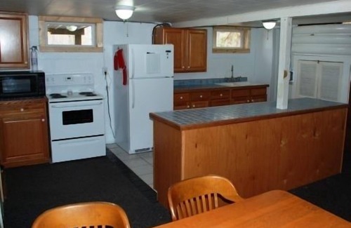 Barryton Cabin | The Card's Nest Rental Cabin on Lake in Wooded Area