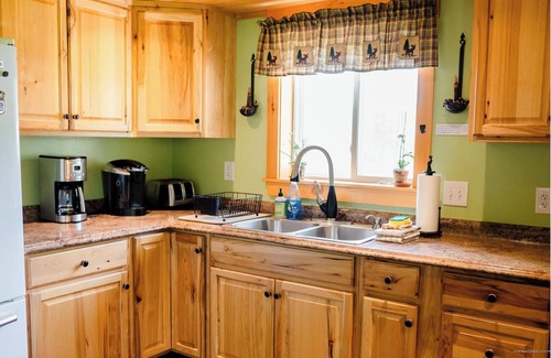 Eustis Ski Chalet | The Chalet 7 bedroom near Sugarloaf, Snowmobile/UTV, Hiking, Golf and Flagstaff