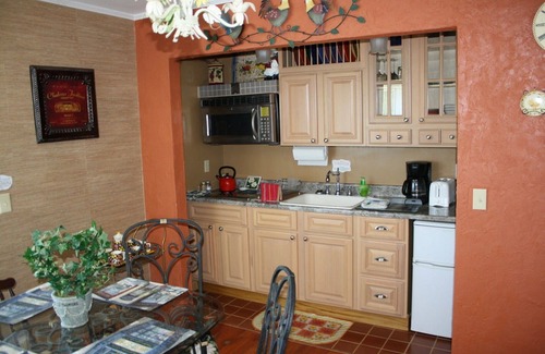 Hardy Villa | The charming French Chateau overlooks the beautiful falls of the Spring River