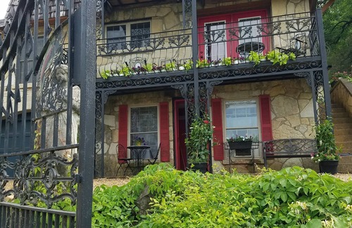 Hardy Villa | The charming French Chateau overlooks the beautiful falls of the Spring River
