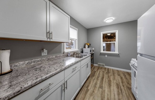 Saint James House | The Christine - 3 bed, 2 bath house has wifi, a work space, and 3 season porch.