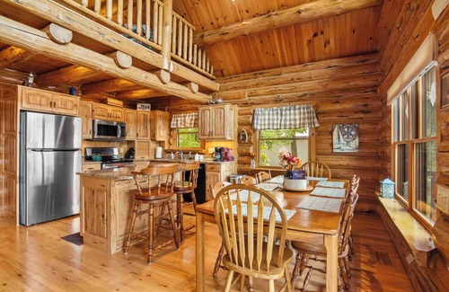 Bellaire House | THE CLAM SHELL Log Home on Clam Lake