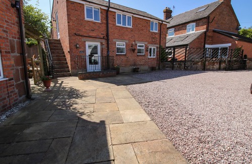 Burlton Cottage | THE COACH HOUSE AT THE GABLES, pet friendly, with a garden in Burlton