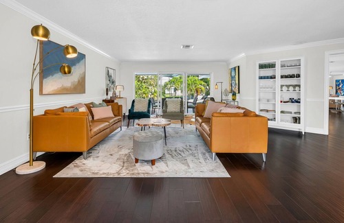 Lake Ida Shores House | The Coconut Canal Hideout- Waterfront, Heated Pool, Minutes to Downtown Delray!