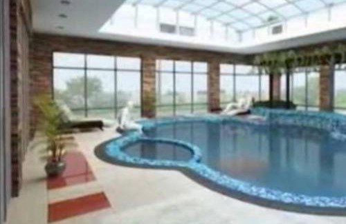 Ngelani Apartment | The Coffee Residences at KINGS MILLENNIUM APARTMENTS, near JKI Airport 3 Bedroom