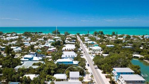 Anna Maria House | The Cottage on Pine - Luxury Boho Beach Cottage wPvt Heated Pool On Pine Ave