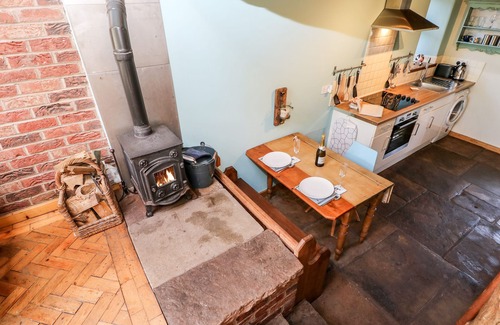 Kirkby Stephen Cottage | THE COW BYRE, luxury holiday cottage, with open fire in Barras