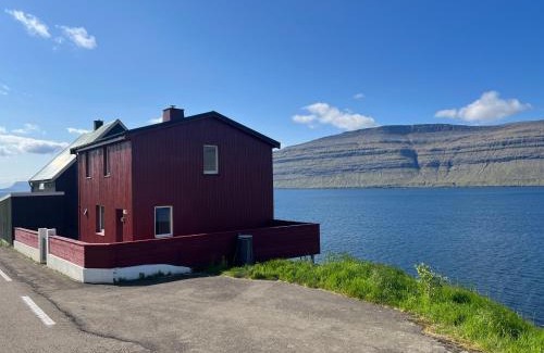 Faroe Islands House | The Cozy red house with Amazing sea view