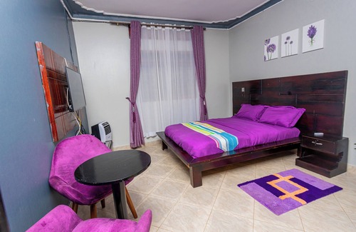 Soroti Bed & Breakfast | The Den Purple